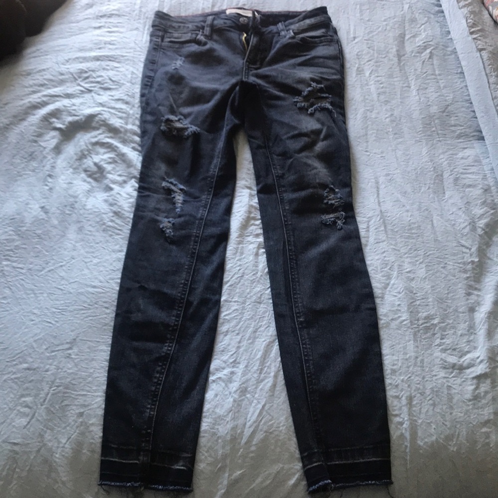 Dark washed ripped skinny jeans